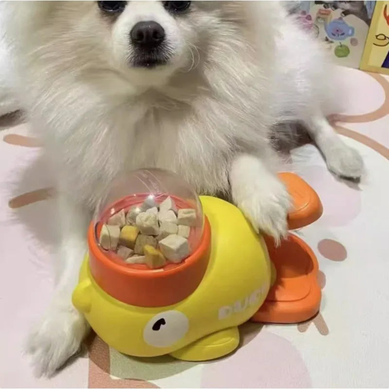 ''Yellow Duck-Shaped Interactive Feeder for Dogs and Cats: A Treat-Dispensing Puzzle Toy Designed for Pet Training''