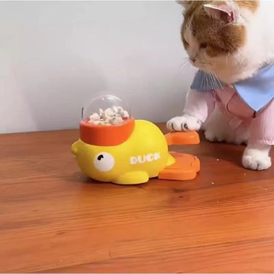 ''Yellow Duck-Shaped Interactive Feeder for Dogs and Cats: A Treat-Dispensing Puzzle Toy Designed for Pet Training''